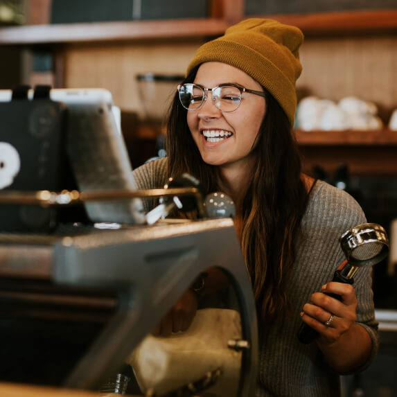 Image of a smiling employee while working